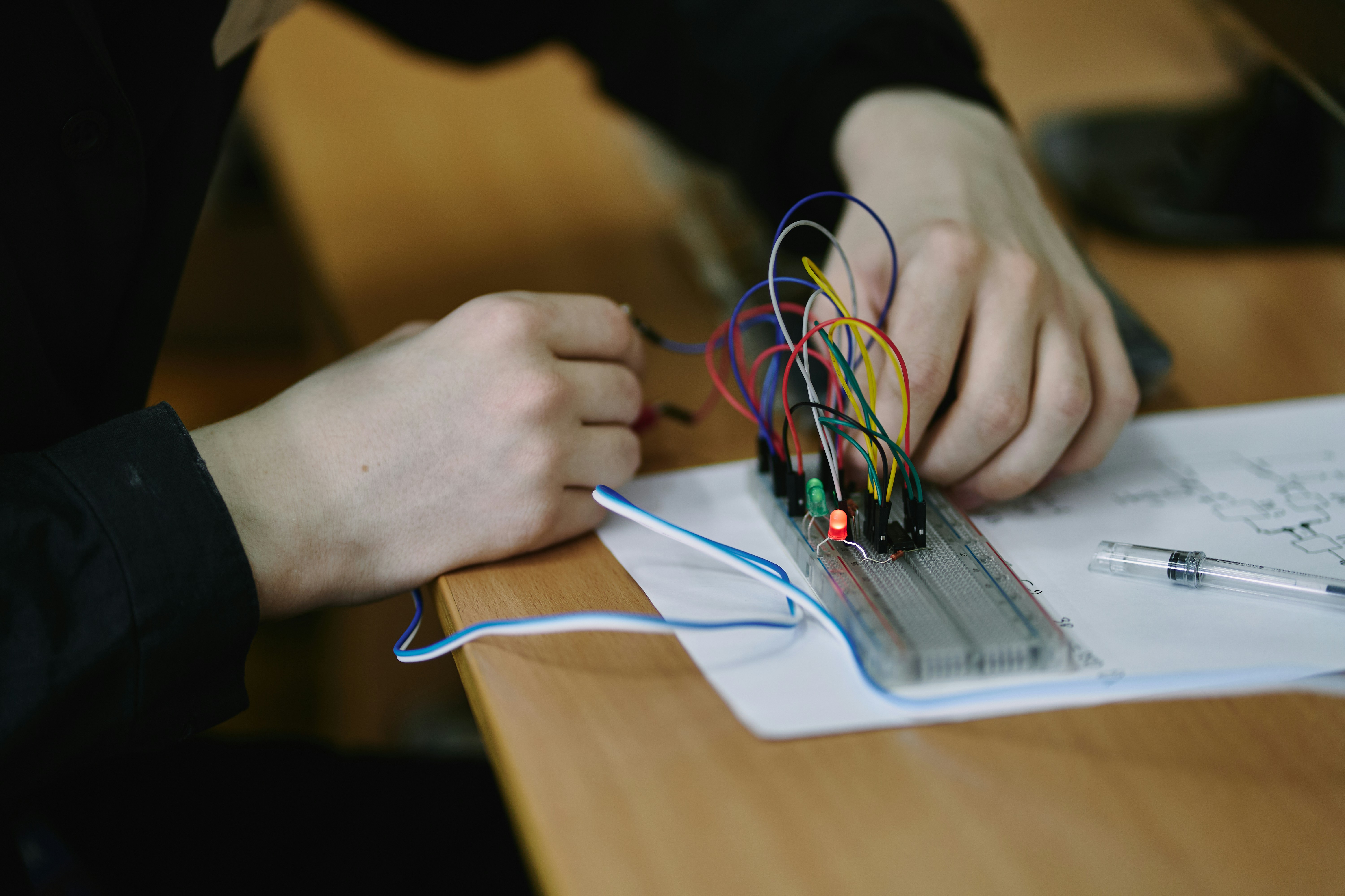engineer analyzing electrical circuit schematics