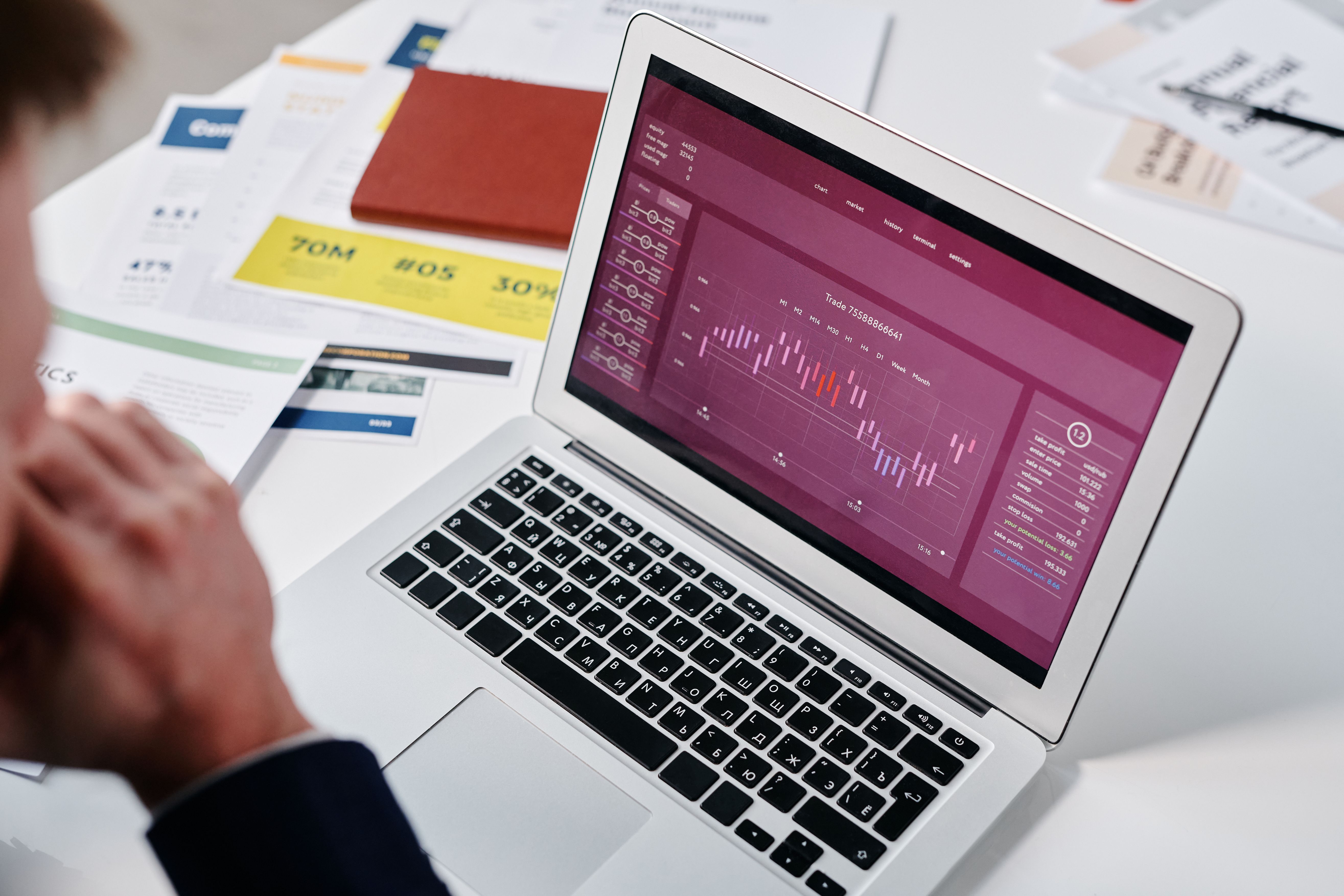 Person reviewing marketing analytics on a laptop
